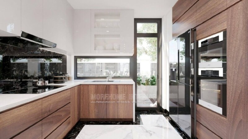 Nếu bạn đã được xem các mẫu tủ bếp đẹp có tay nắm, thì có thể những mẫu tủ bếp đó đã lỗi thời, trang trí phòng bếp với toàn bộ bề mặt cánh tủ trơn nhẵn là một sự đổi mới hoàn hảo, không chút tay cầm nhưng lại kéo đẩy dễ dàng nhờ ý tưởng thiết kế vát từ cánh tủ giúp bề mặt gọn gàng mà đẹp mắt. Tủ bếp đẹp